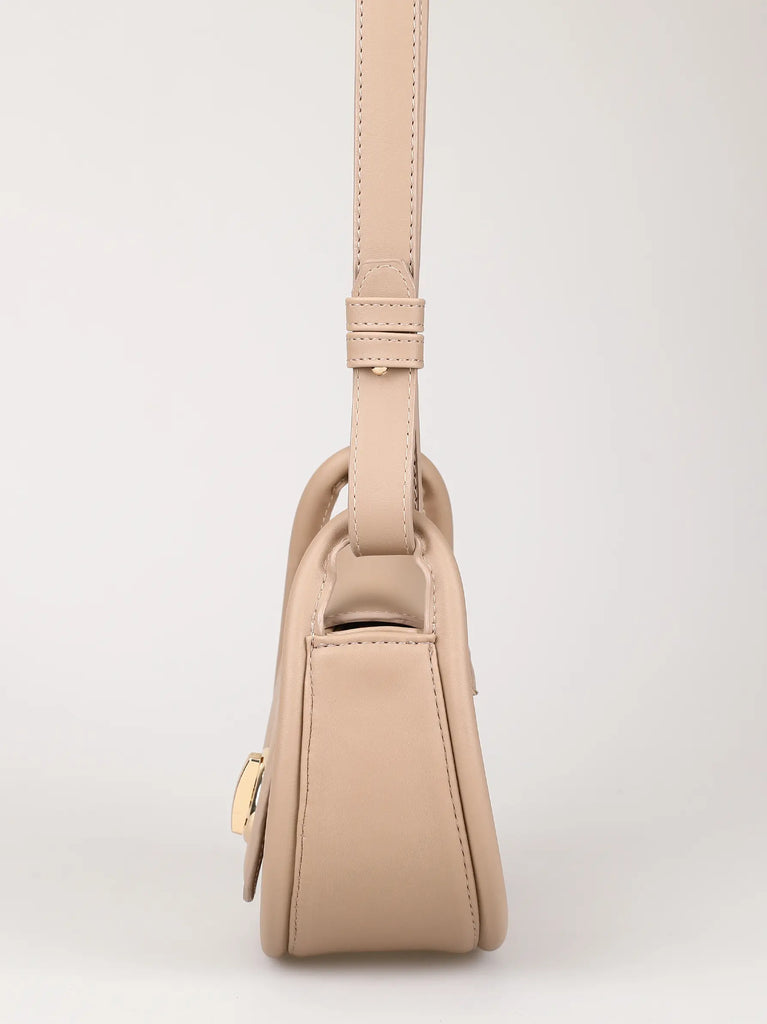 beige round tubular cross body bag