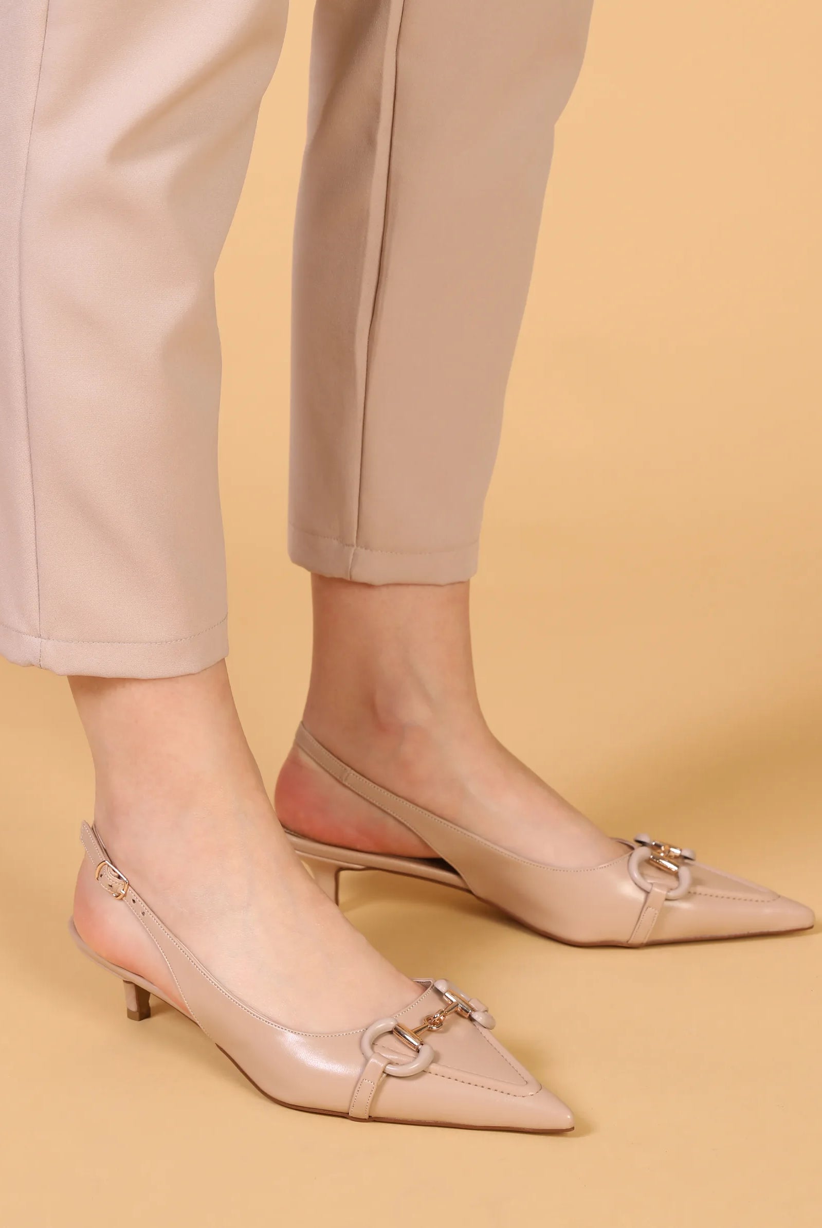 gold buckle heels