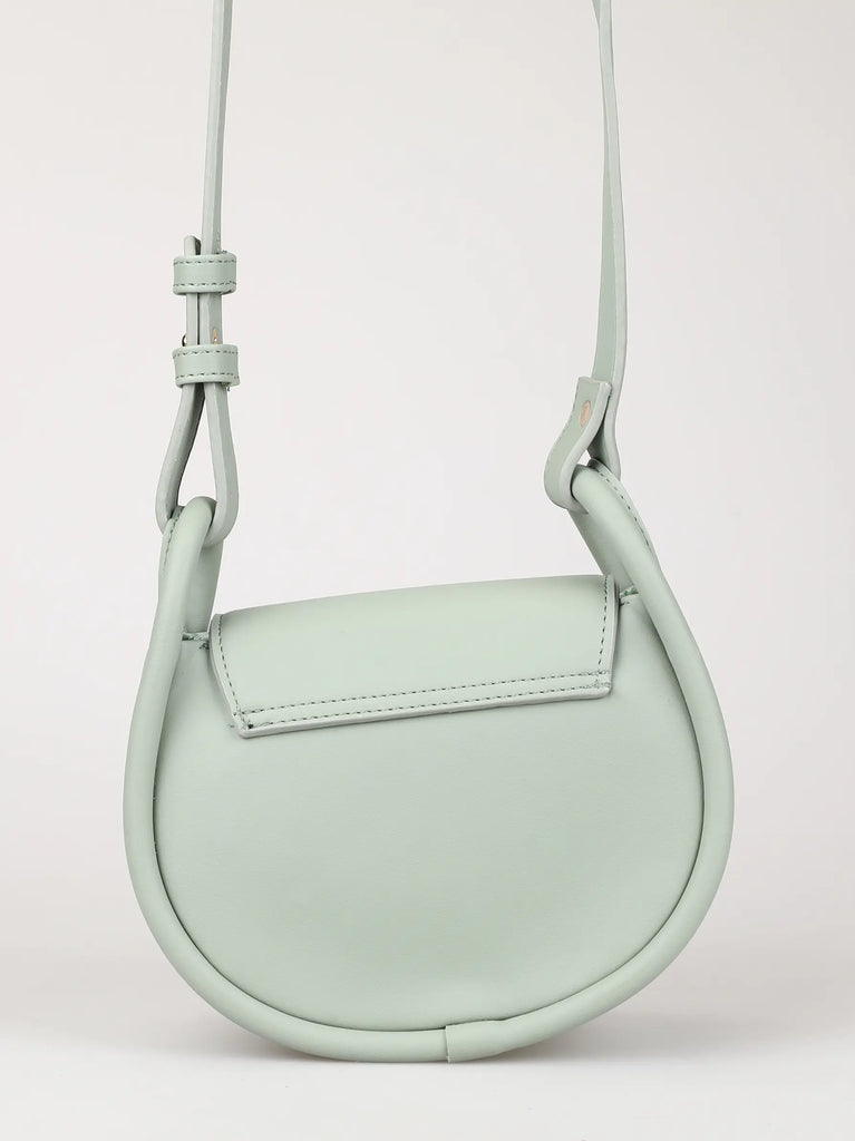 round tubular cross body bag