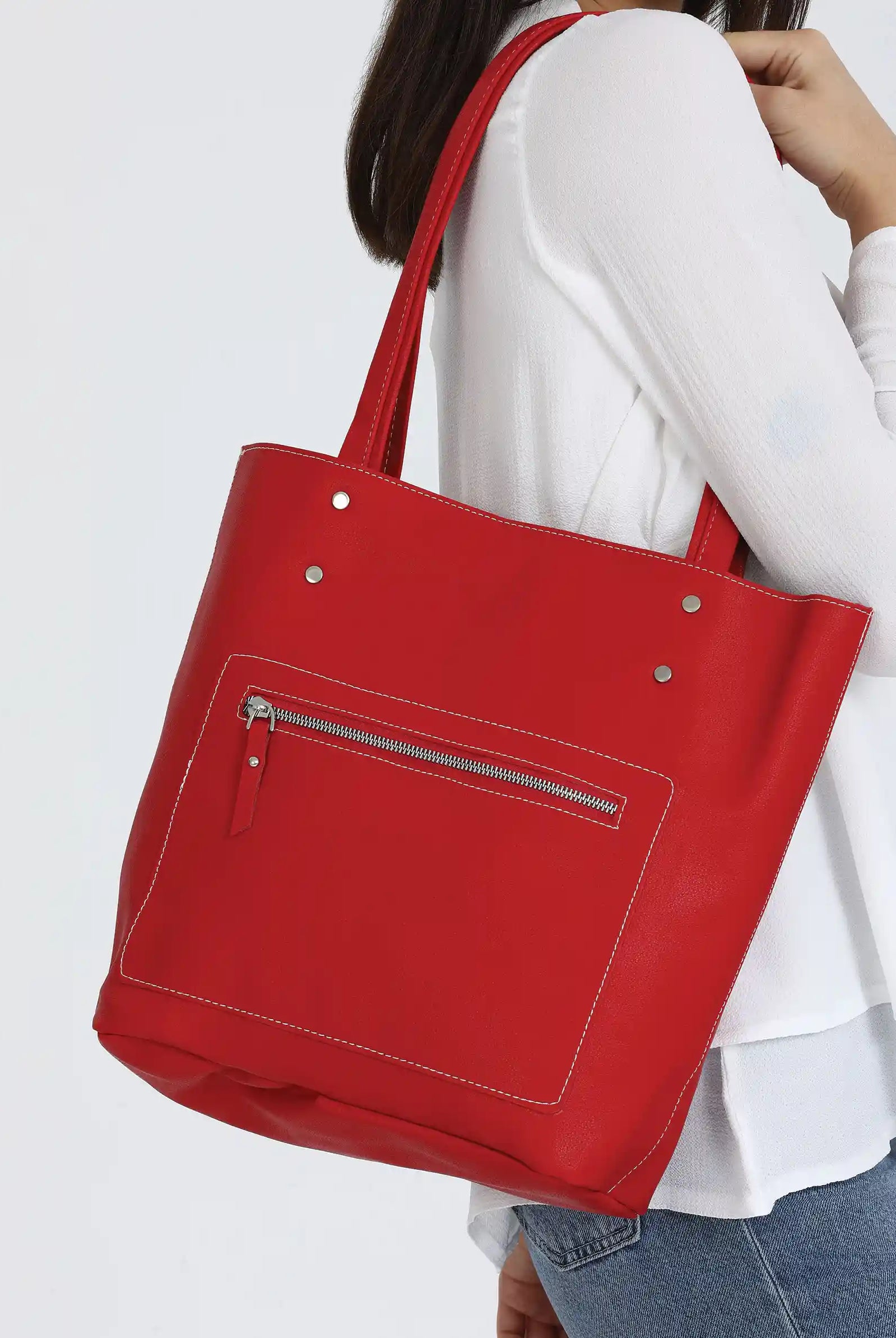red leather tote bag