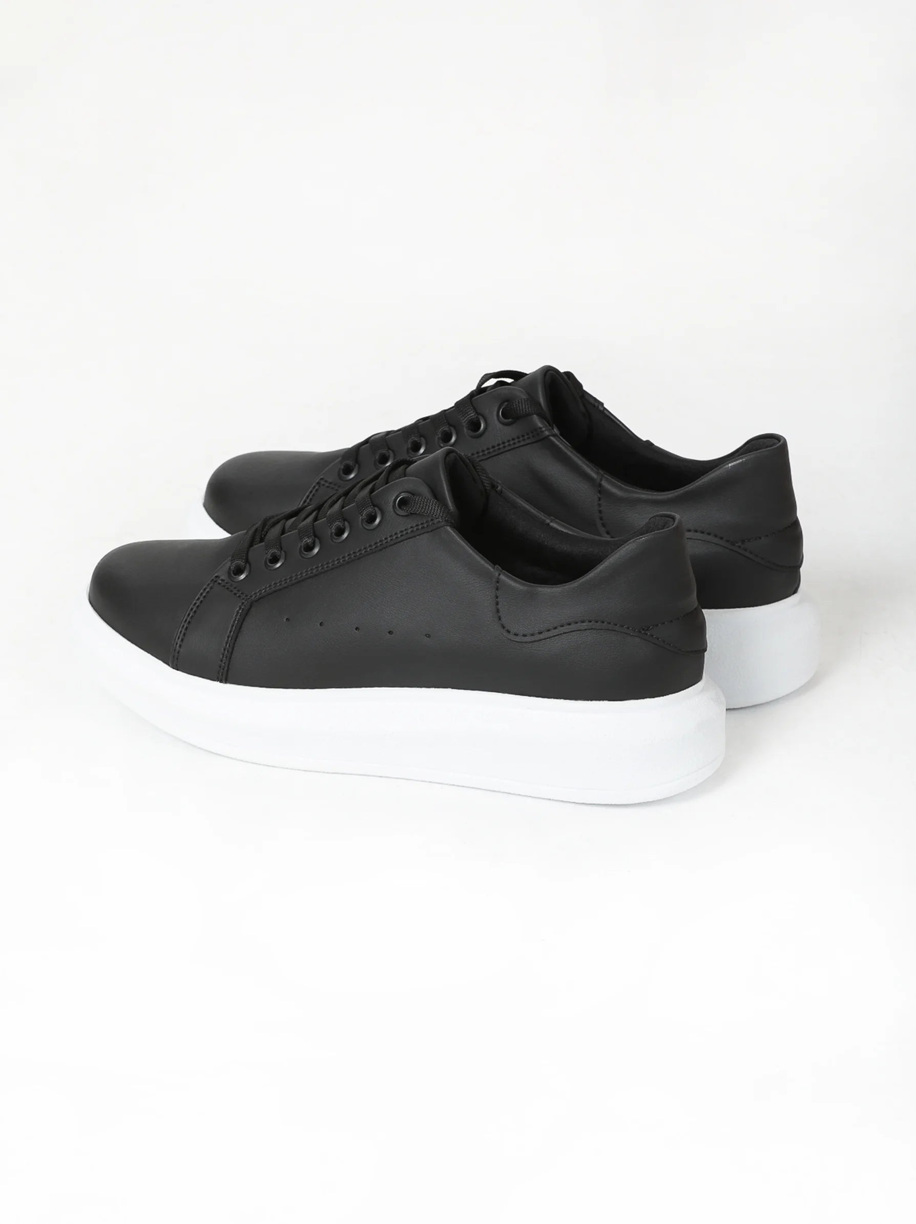 Flat black best sale trainers