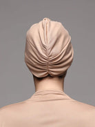 beige swimming cap