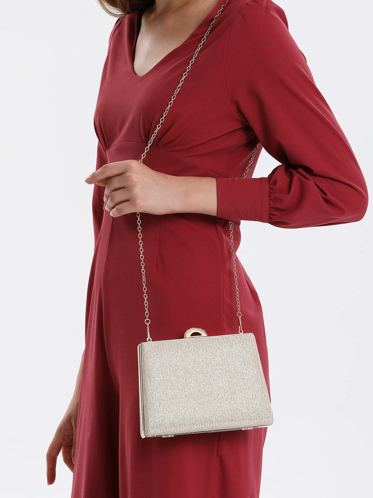 gold glitter metal clutch bag