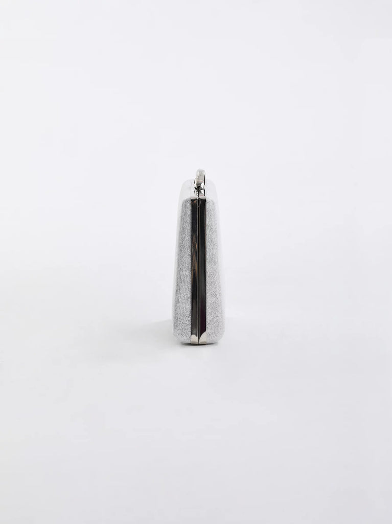 metal handle silver clutch bag