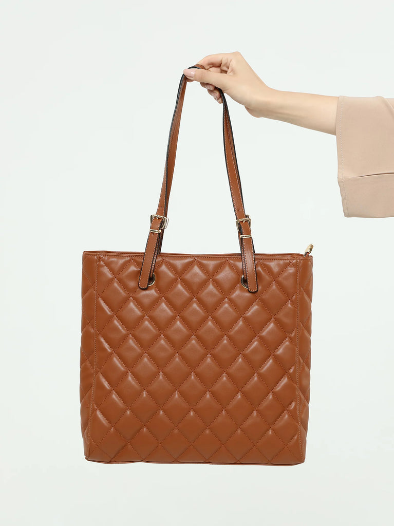 quilted tan bag